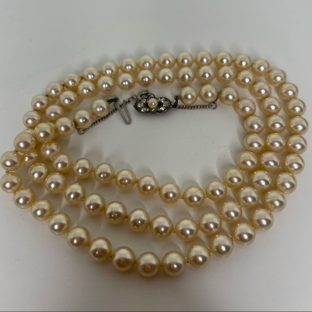 Majorica “Rosa”Pearls w/ case + certificate. 28” L, 7mm Pearl size. Excellent